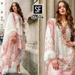 HEAVY NET WITH EMBROIDERY AND MOTI WORK suits